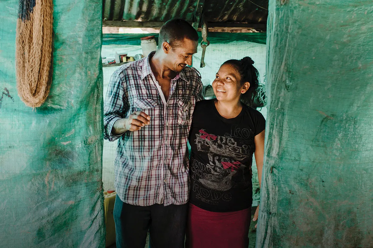 Two people smiling